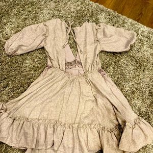 Mini dress with open back and plunging neck line